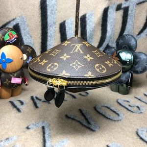 Authentic Louis Vuitton Toupie Monogram Marron